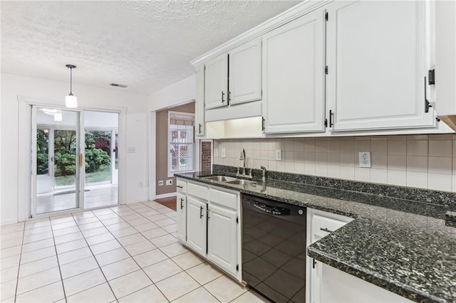 kitchen with backsplash, black dishwasher, a textured ceiling, and a sink