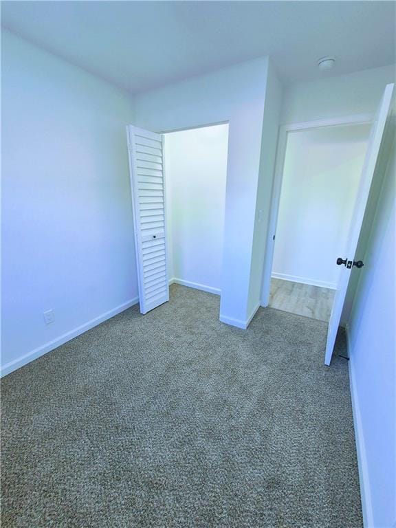 unfurnished bedroom featuring carpet floors