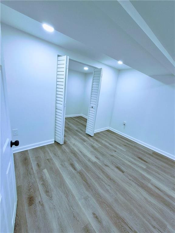 basement with light wood-type flooring