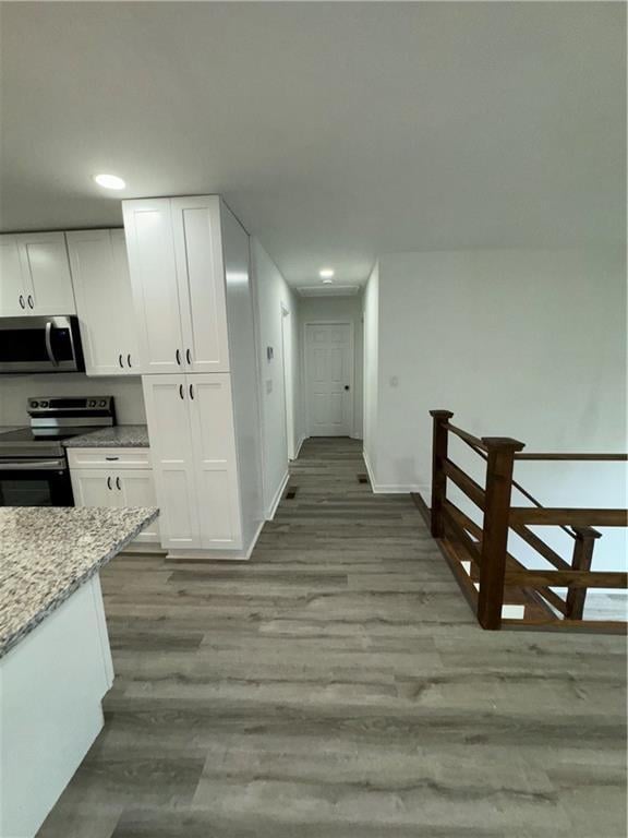 hall featuring light hardwood / wood-style flooring