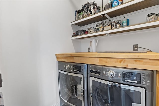 laundry room with washer and dryer