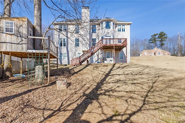 back of property featuring a deck