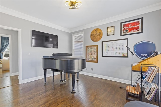 sitting room with crown molding and dark hardwood / wood-style floors