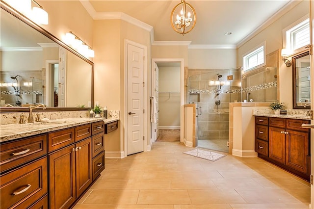 bathroom featuring tile patterned flooring, a chandelier, an enclosed shower, vanity, and ornamental molding