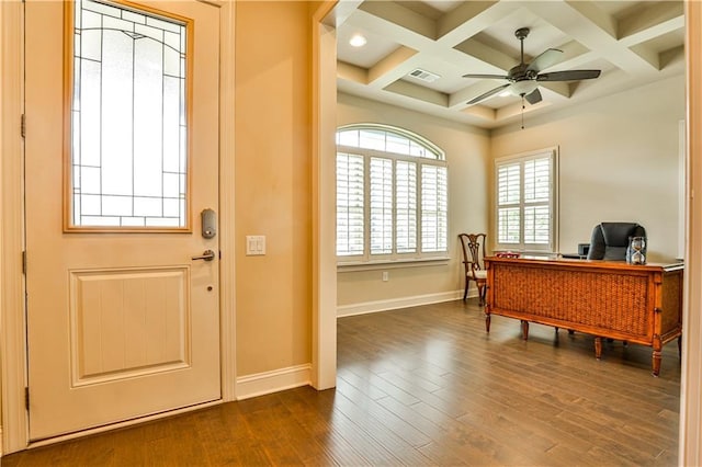 office space featuring beam ceiling, ceiling fan, dark hardwood / wood-style flooring, and coffered ceiling