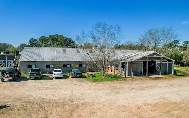 view of front facade with an outbuilding