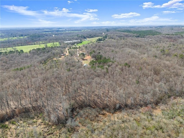 aerial view featuring a forest view