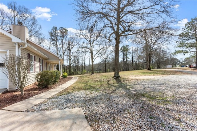 view of yard with driveway