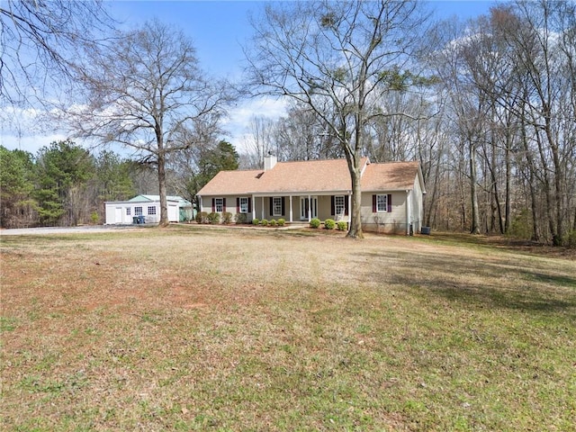 single story home with a front lawn and a chimney