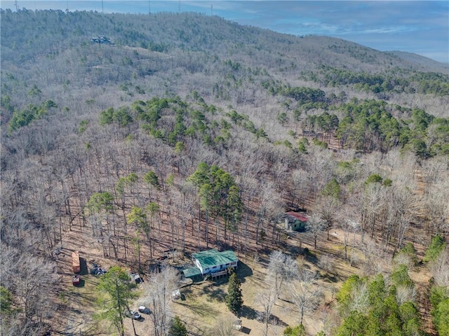 bird's eye view featuring a mountain view and a view of trees