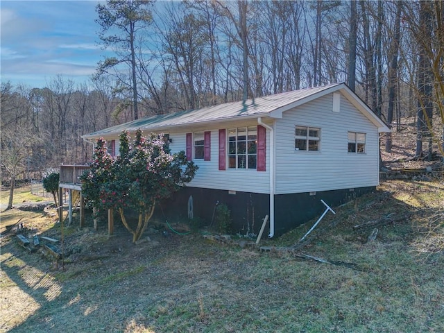 view of front of house featuring metal roof