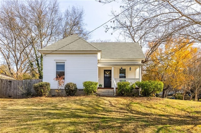 bungalow-style home with a front lawn and covered porch