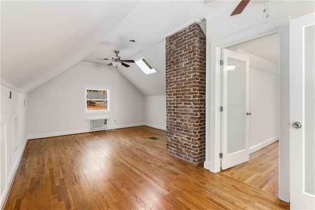 bonus room featuring vaulted ceiling, ceiling fan, and hardwood / wood-style floors