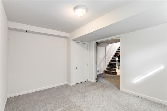 basement with light carpet