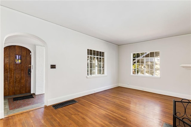 entrance foyer featuring hardwood / wood-style floors