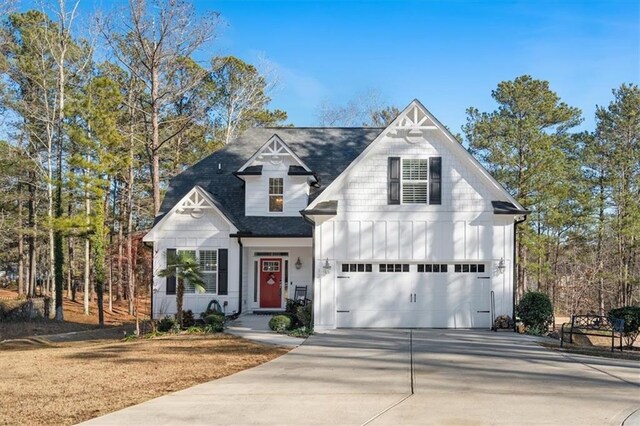 front of property featuring a garage and a front yard