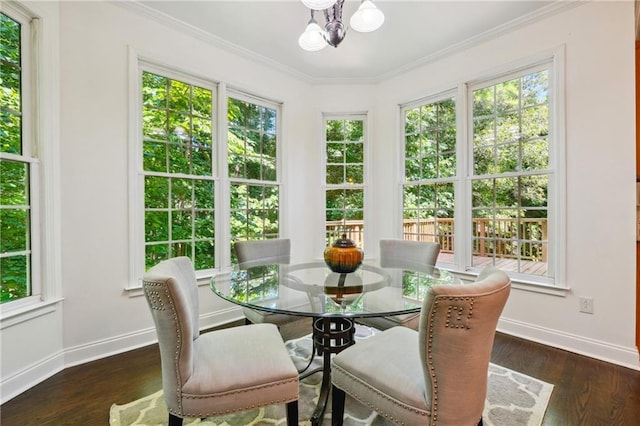 sunroom / solarium featuring a chandelier and a healthy amount of sunlight