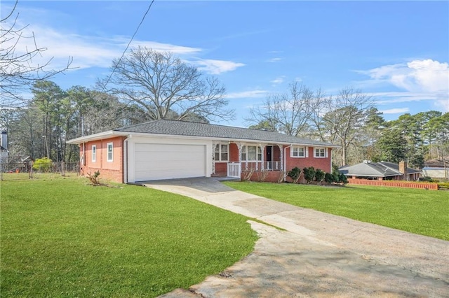 view of front facade with a porch, a garage, and a front lawn