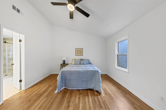 bedroom with ceiling fan and light hardwood / wood-style floors