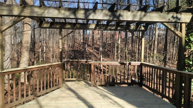 deck featuring a pergola