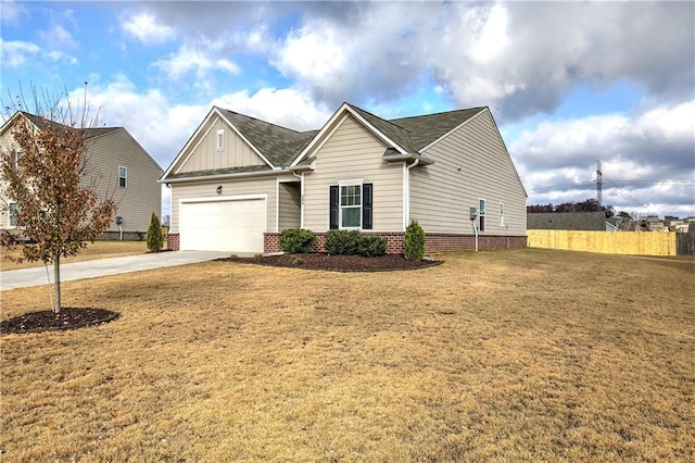 view of front of home featuring a garage and a front lawn