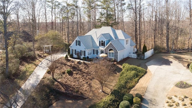 drone / aerial view with a view of trees