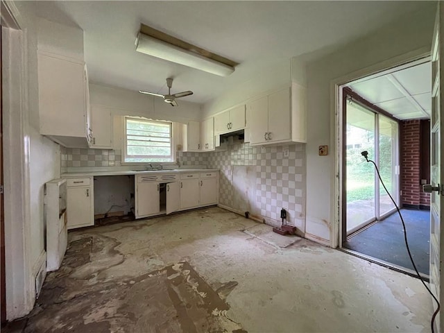 kitchen with white cabinets, a ceiling fan, decorative backsplash, and light countertops