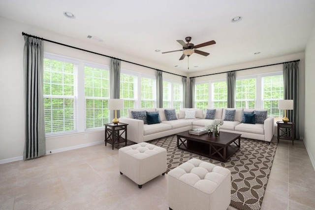 living area featuring ceiling fan, visible vents, light tile patterned floors, baseboards, and recessed lighting