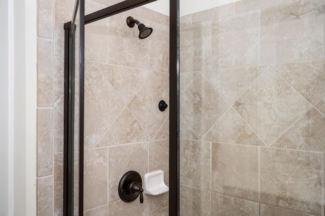 full bathroom featuring a shower stall
