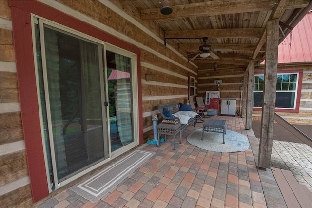 view of terrace featuring ceiling fan