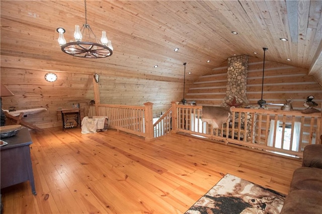 additional living space featuring light hardwood / wood-style flooring, lofted ceiling, wood ceiling, and ceiling fan with notable chandelier