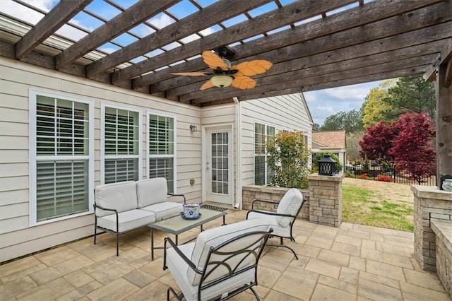 view of patio with ceiling fan, an outdoor hangout area, and a pergola