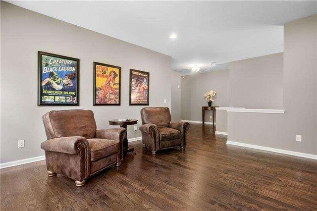 living area featuring dark hardwood / wood-style floors