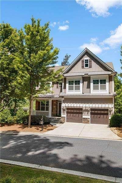 craftsman inspired home featuring a porch and a garage