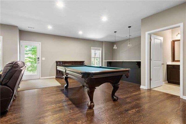 rec room featuring a wealth of natural light, hardwood / wood-style flooring, and billiards