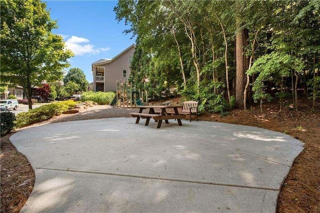 view of patio with a playground