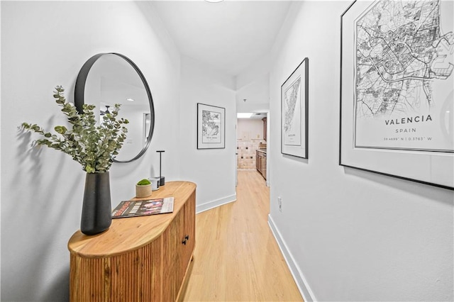 corridor featuring light hardwood / wood-style floors