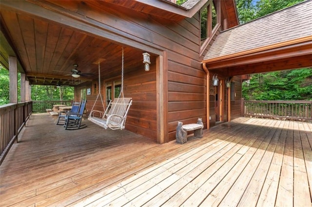 wooden deck with ceiling fan