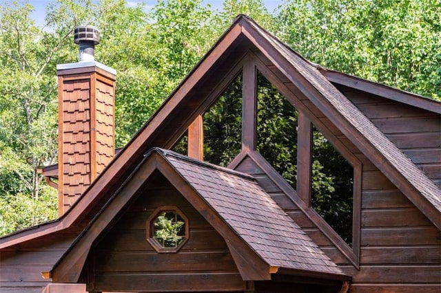exterior details with a chimney