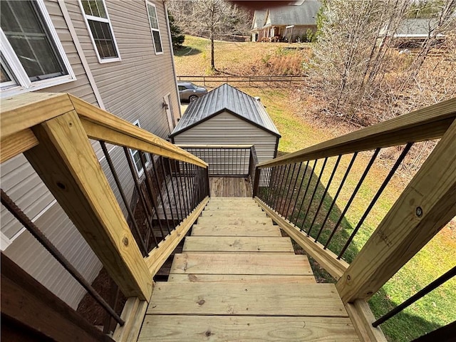 wooden deck featuring stairway