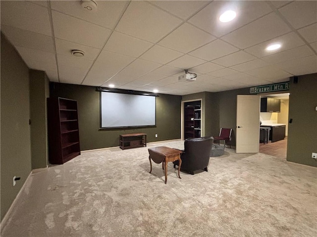 cinema featuring recessed lighting, baseboards, a paneled ceiling, and carpet flooring