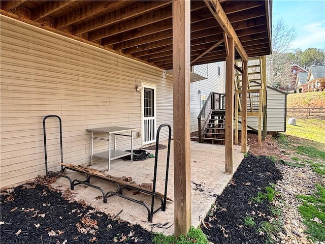 view of patio featuring stairs