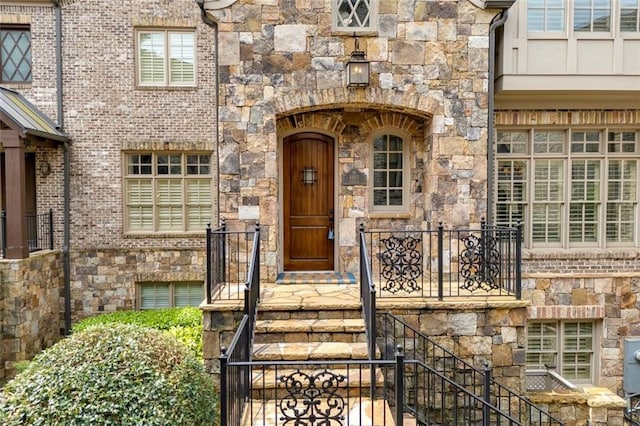 4853 Stonehall Pl, Atlanta, GA 30339 - doorway to property featuring stone siding