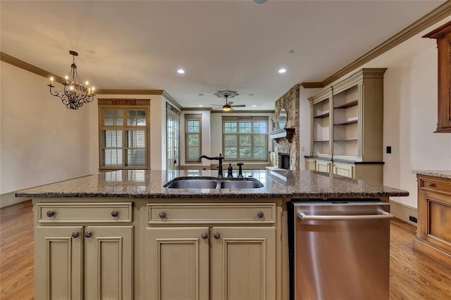 4853 Stonehall Pl, Atlanta, GA 30339 - kitchen featuring dishwasher, a sink, a fireplace, light wood-type flooring, and crown molding