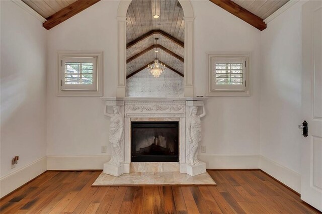 4853 Stonehall Pl, Atlanta, GA 30339 - detailed view of wood finished floors, baseboards, and a fireplace