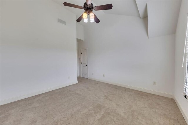4853 Stonehall Pl, Atlanta, GA 30339 - unfurnished room featuring ceiling fan, light colored carpet, baseboards, and high vaulted ceiling