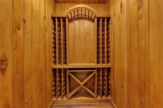 4853 Stonehall Pl, Atlanta, GA 30339 - wine room featuring wood walls and wooden ceiling
