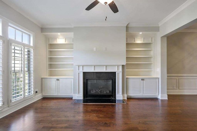 1117 Cordia Ave, Atlanta, GA 30318 - unfurnished living room with built in features, crown molding, a ceiling fan, a glass covered fireplace, and dark wood-style floors