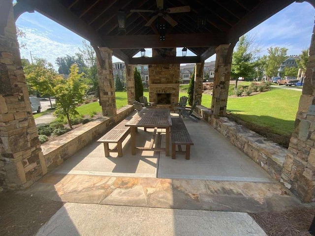 1117 Cordia Ave, Atlanta, GA 30318 - view of patio / terrace with an outdoor stone fireplace and a gazebo