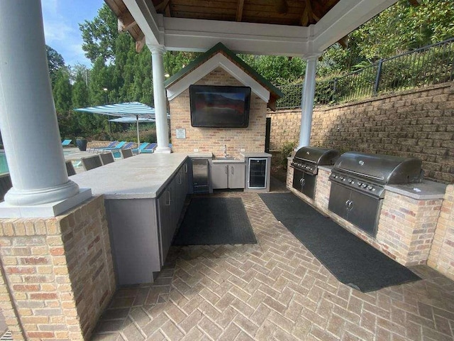 1117 Cordia Ave, Atlanta, GA 30318 - view of patio featuring an outdoor kitchen and wine cooler